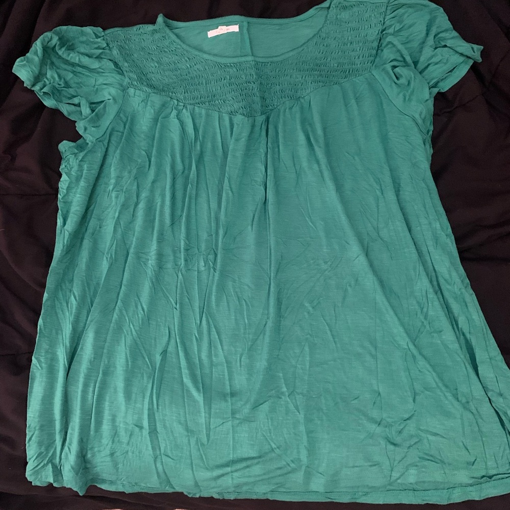 Green Maurice’s shirt